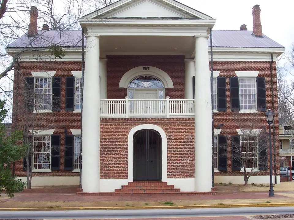 Front of the 1836 Lumpkin County Courthouse, now the Dahlonega Gold Museum, with white columns and an arched door