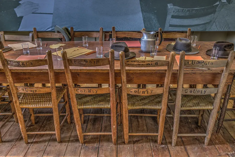 Jury room in the 1836 courthouse: long wooden table with chairs stencilled Lumpkin County